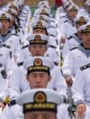 FILE - Chinese sailors sit in rows during a tour arranged for foreign journalists, a day before the opening of the West Pacific Naval Symposium in Qingdao in eastern China's Shandong province, April 21, 2024. 