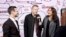 Ryan Lewis (L) and Macklemore are interviewed as they attend the YouTube Music Awards in New York, Nov. 3, 2013. 