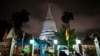 Locals wait in line overnight for free coronavirus testing at Wat Phra Si Mahathat temple in Bangkok, Thailand, July 9, 2021, as faced with rapidly rising numbers of new coronavirus infections, major Asia-Pacific cities implemented new restrictions. 