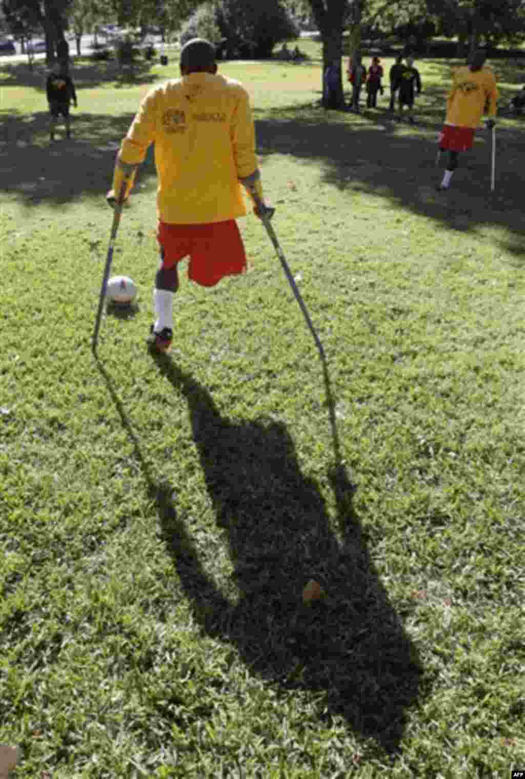 Members of the Haitian National Amputee Soccer Team play an exhibition match on the grounds of the Texas state capitol, Tuesday, Nov. 16, 2010 in Austin, Texas. The team is touring throughout the country to raise support for amputee soccer and for Haiti, 