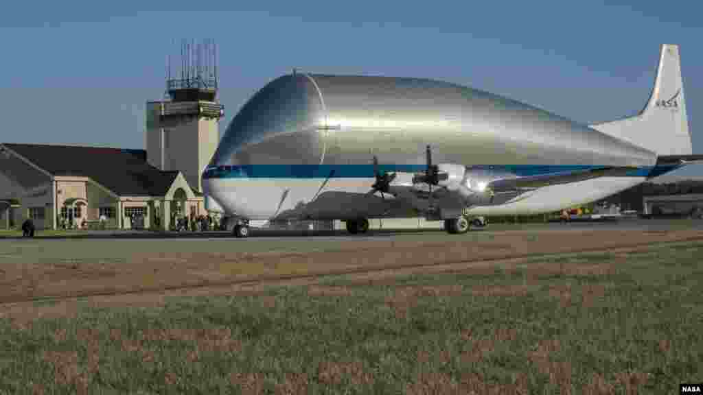 NASA&rsquo;s Super Guppy, a wide-bodied cargo aircraft, landed at the Redstone Army Airfield near Huntsville, Alabama with a special delivery: an innovative composite rocket fuel tank, Mar. 26, 2014.