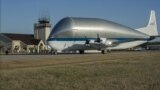NASA&rsquo;s Super Guppy, a wide-bodied cargo aircraft, landed at the Redstone Army Airfield near Huntsville, Alabama with a special delivery: an innovative composite rocket fuel tank, Mar. 26, 2014.