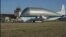 NASA&rsquo;s Super Guppy, a wide-bodied cargo aircraft, landed at the Redstone Army Airfield near Huntsville, Alabama with a special delivery: an innovative composite rocket fuel tank, Mar. 26, 2014.