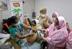 FILE PHOTO: COVID-19 vaccination in Mumbai