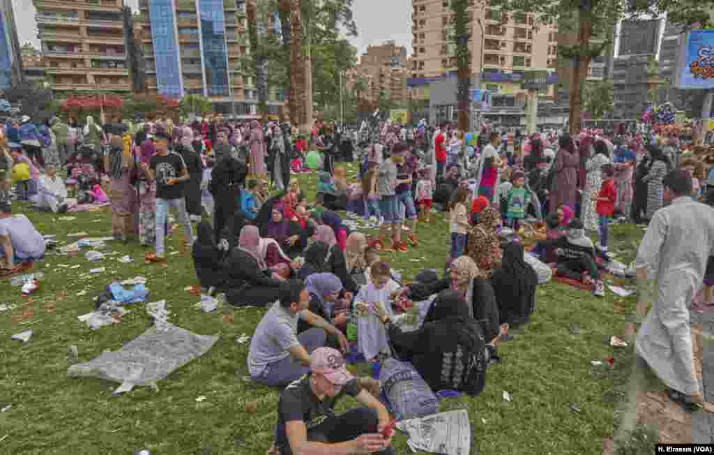 Egyptian Muslim Families get together after attending Eid Al-Fitr prayers in Cairo, Egypt, June 5, 2019.