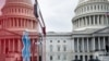 A view of the Capitol's Rotunda is seen reflected in an ambulance on Capitol Hill in Washington, March 24, 2020.