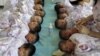 Newly born babies receive vaccines at a hospital in Aksu, Xinjiang Uighur Autonomous Region, August 10, 2012. 