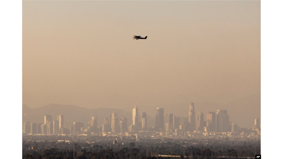 Haze from various wildfires hangs over the downtown skyline, Sept. 11, 2024, in Los Angeles.