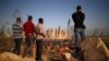 People view the damaged site of Tuesday's blast in Beirut's port area, Lebanon, Aug. 7, 2020. 