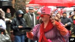 Woman in a traditional British pancake race prior to Lent