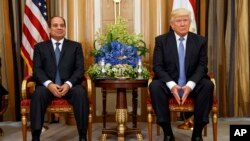 FILE - In this May 21, 2017 file photo, U.S. President Donald Trump, right, holds a bilateral meeting with Egyptian President Abdel Fattah al-Sisi in Riyadh.