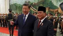 Presiden China Xi Jinping dan Presiden Prabowo Subianto mengadiri upacara penyambutan di Great Hall of the People di Beijing, China, pada 9 November 2024. (Foto: Reuters/Florence Lo)