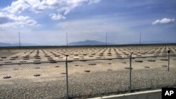 FILE - Nuclear waste is stored in underground containers at the Idaho National Laboratory near Idaho Falls, Idaho, in this May 11, 2015, photo. Federal officials will shut down a nuclear waste treatment project.