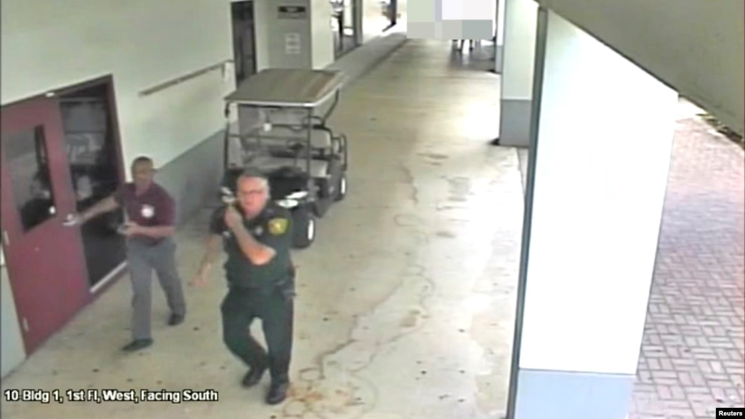 Then-Broward County Sheriff's Deputy Scot Peterson, who was assigned to Marjory Stoneman Douglas High School during the Feb. 14, 2018, shooting, is seen in this still image captured from the school surveillance video released by Broward County Sheriff's Office in Florida, March 15, 2018. 