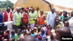 Fearing Boko Haram attacks, an estimated 9,000 Nigerians recently have fled to Cameroon. Others have sought safety in their home country, as seen at a refugee camp in Wurojuli, in Nigeria's Gombe state, Sept. 1, 2014.