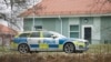 A police vehicle is seen near a Campus Risbergska building in Orebro, Sweden, on Feb. 4, 2025. Five people were shot at the school, police said. (TT news agency via AFP)