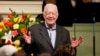 FILE - Former President Jimmy Carter teaches Sunday School class at the Maranatha Baptist Church in Plains, Ga., Aug. 23, 2015. The Fox theater in Atlanta recently hosted dozens of musical acts and thousands of guests for a concert celebrating Carter's 100th birthday.