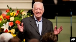 FILE - Former President Jimmy Carter teaches Sunday School class at the Maranatha Baptist Church in his hometown of Plains, Ga., Aug. 23, 2015.