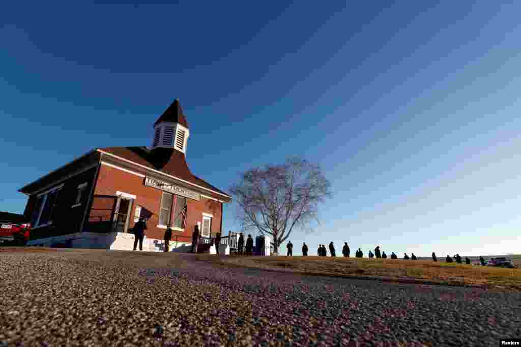 Voters line up at the Trenton Town Hall during Election Day in Trenton, Wisconsin, Nov. 3, 2020. 