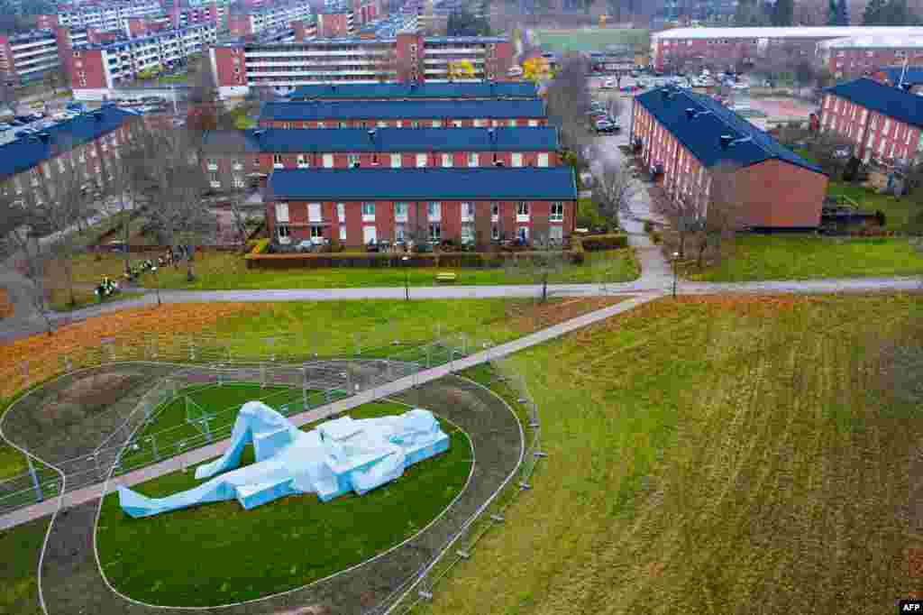This aerial view photo shows one of two "Varbergs Giants," a giant sculpture by French artist Xavier Veilhan, displayed in Varberg, south of Stockholm, Sweden.
