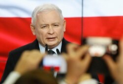 Leader of Poland's ruling party Jaroslaw Kaczynski speaks in reaction to exit poll results right after voting closed in the nation's parliamentary election, in Warsaw, Oct. 13, 2019.