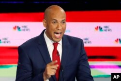 FILE - Democratic presidential candidate Sen. Cory Booker, D-N.J., speaks during a Democratic primary debate hosted by NBC News at the Adrienne Arsht Center for the Performing Art, in Miami, June 26, 2019.