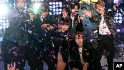 BTS perform at the Times Square New Year's Eve celebration on Tuesday, Dec. 31, 2019, in New York. (Photo by Ben Hider/Invision/AP)