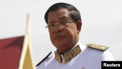 FILE - Cambodian Prime Minister Hun Sen attends the funeral ceremony of Chea Sim.