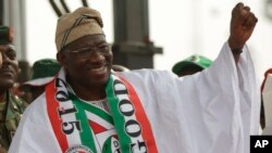 Nigeria President Goodluck Jonathan gestures, during an election campaign rally, at Tafawa Balewa Square in Lagos, Nigeria, Jan. 8, 2015.