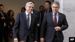 Judge Merrick Garland (L), President Barack Obama’s choice to replace the late Justice Antonin Scalia on the Supreme Court, meets with Senate Judiciary Committee member, Democratic Senator Al Franken, on Capitol Hill in Washington, March 30, 2016.