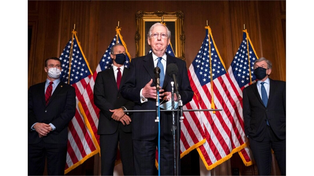 Senate Majority Leader Mitch McConnell of Kentucky speaks to the media after the Republican's weekly Senate luncheon, at the Capitol in Washington, Dec. 8, 2020.