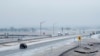 Motorists make their way along Interstate 380 in North Liberty, Iowa, Dec. 14, 2024. (Nick Rohlman/The Gazette via AP)