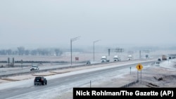 Motorists make their way along Interstate 380 in North Liberty, Iowa, Dec. 14, 2024. (Nick Rohlman/The Gazette via AP)