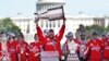 Washington Capitals&#39; Alex Ovechkin of Russia holds up the Stanley Cup trophy during the NHL hockey team&#39;s Stanley Cup victory celebration at the National Mall in Washington, June 12, 2018.