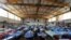 People who fled their homes during wildfires are accommodated at an indoor hall in Chalkida the capital of Evia island, about 81 kilometers (50 miles) north of Athens, Greece, Aug. 7, 2021.
