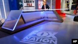 FILE - Fox News senior judicial analyst Andrew Napolitano is seen hosting a broadcast at Fox studios, in New York, Nov. 27, 2018.