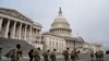 Members of the National Guard arrive to the U.S. Capitol days after supporters of U.S. President Donald Trump stormed the Capitol in Washington, D.C.