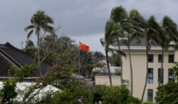 FILE - A Chinese flag flies outside the Chinese Embassy in Nuku'alofa, Tonga, April 8, 2019.