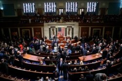 House members vote on the House resolution to move forward with procedures for the next phase of the impeachment inquiry into President Trump in the House Chamber on Capitol Hill in Washington, Oct. 31, 2019.