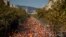 Pro-Spain demonstrators gather a long a street during a protest called by a unionist Catalan civil society group in Barcelona, Spain, Oct. 27, 2019. 
