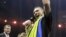 Олександр Усик святкує перемогу над Муратом Гассієвим
