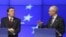 European Council President Herman Van Rompuy, right, and European Commission President Jose Manuel Barroso, address the media at the end of an EU summit, at the European Council building in Brussels, May 24, 2012. 