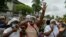 Les femmes du Rassemblement démocratique africain (PDCI-RDA) et le Front populaire ivoirien (FPI) protestent contre un troisième mandat du président ivoirien Alassane Ouattara, dans le district de Cococdy à Abidjan le 21 août , 2020. (Photo par Issouf SANOGO / AFP)