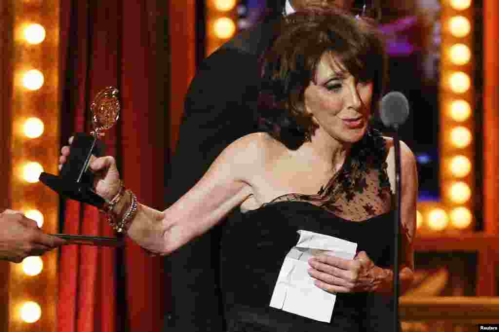 Actress Andrea Martin accepts the award for Best Performance by an Actress in a Featured Role in a Musical for &quot;Pippin&quot; during the Tony Awards in New York, June 9, 2013. 