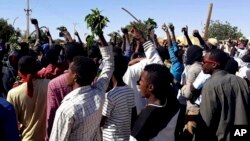 FILE - People chant against the government during a protest in Kordofan, Sudan, Dec. 23, 2018. 