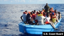 84 Haitian migrants on a 42-foot vessel approximately 30 miles southwest of Turks and Caicos Islands, Oct. 28, 2018. While on routine patrol the cutter Thetis crew located the migrant vessel and embarked all 84 migrants for repatriation to Port-au-Prince,