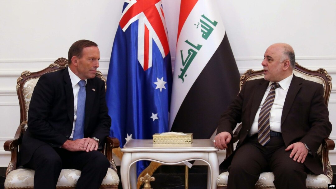 A handout picture released by Iraq's Prime Minister's office shows Iraqi Prime Minister Haider al-Abadi (R) and his Australian counterpart Tony Abbott meeting in Baghdad, Jan. 4, 2015.