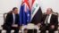 A handout picture released by Iraq's Prime Minister's office shows Iraqi Prime Minister Haider al-Abadi (R) and his Australian counterpart Tony Abbott meeting in Baghdad, Jan. 4, 2015.