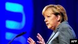 Merkel: Ekzistojnë probleme në punësimin e imigrantëve në strukturat qeveritare