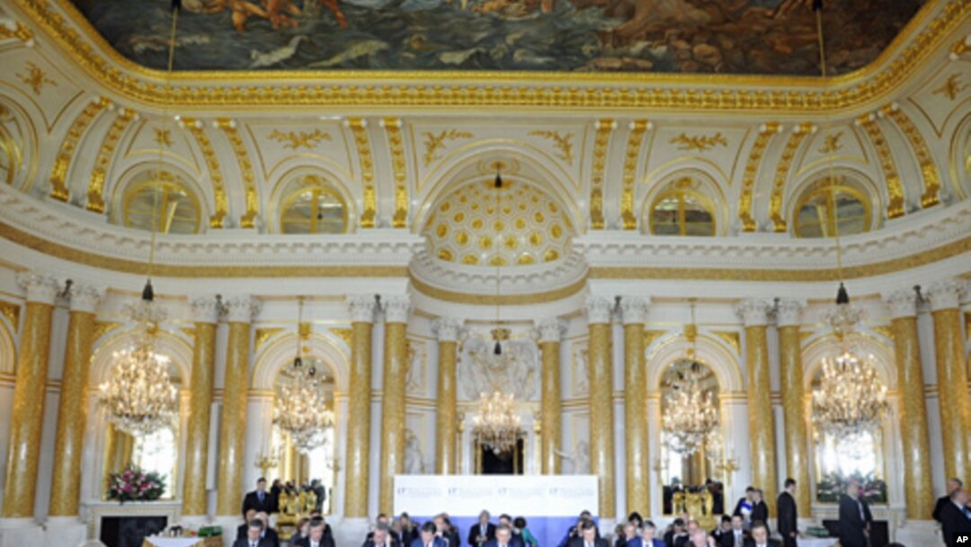 Presidents of 20 East and Central European countries attend a plenary session at the Royal Castle in Warsaw, Poland, May 27, 2011. The summit will be joined by US President Barack Obama